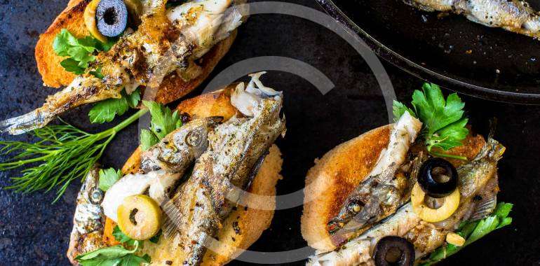 Sandwiches, tapas with grilled fish